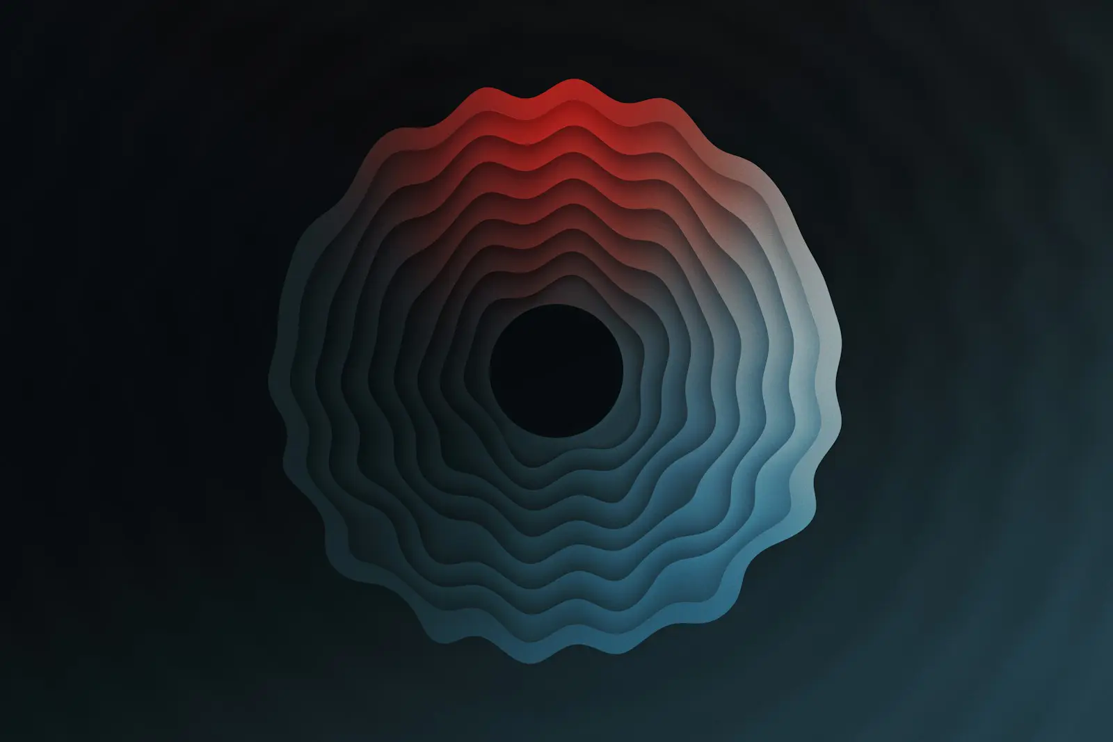 a black background with red and blue shapes