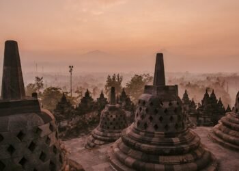 gold and white temple under blue sky during daytime