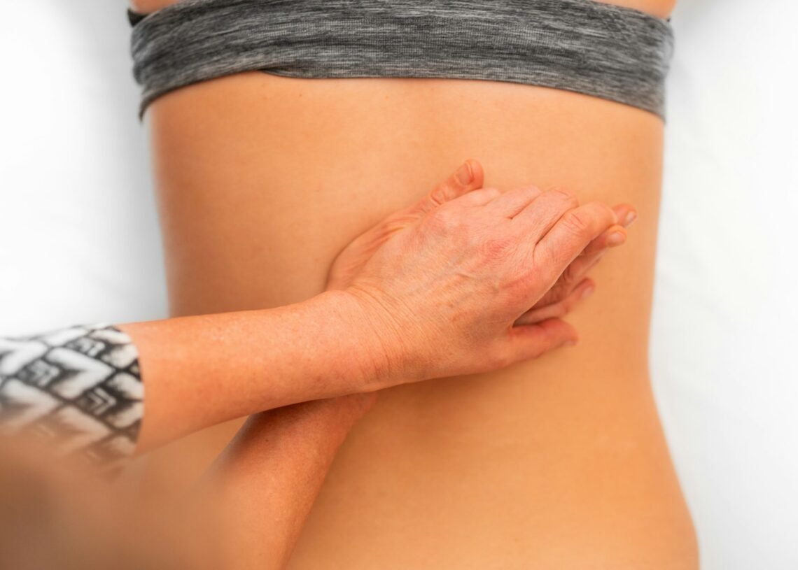 person in black and white striped long sleeve shirt