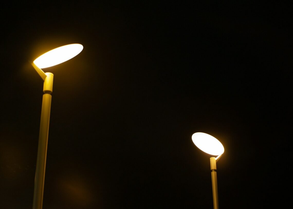 white light bulb turned on during nighttime