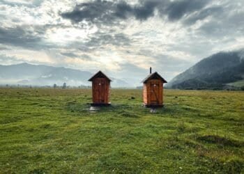small buildings in a field