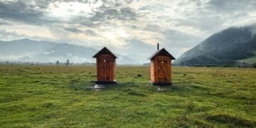small buildings in a field
