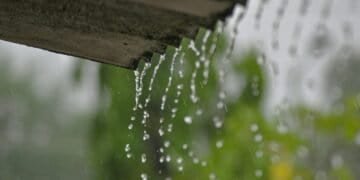 a rain gutter with water running down it