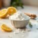 Bicarbonate de soude : 15 usages validés santé et maison 7 Bicarbonate de soude dans un bol blanc avec citron et herbes — bicarbonate de soude utilisation